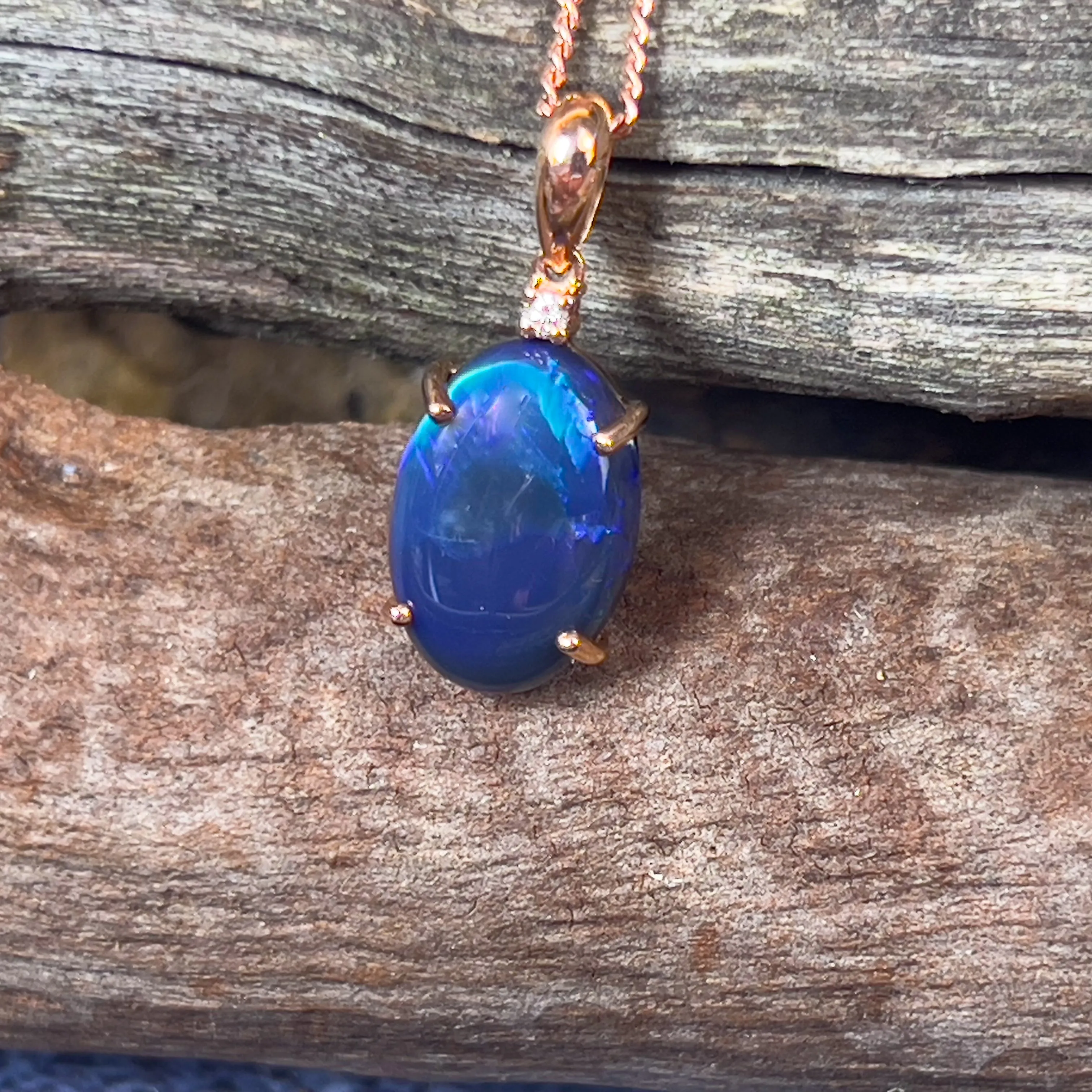 14kt Rose Gold Black Opal 14.2x9.5mm