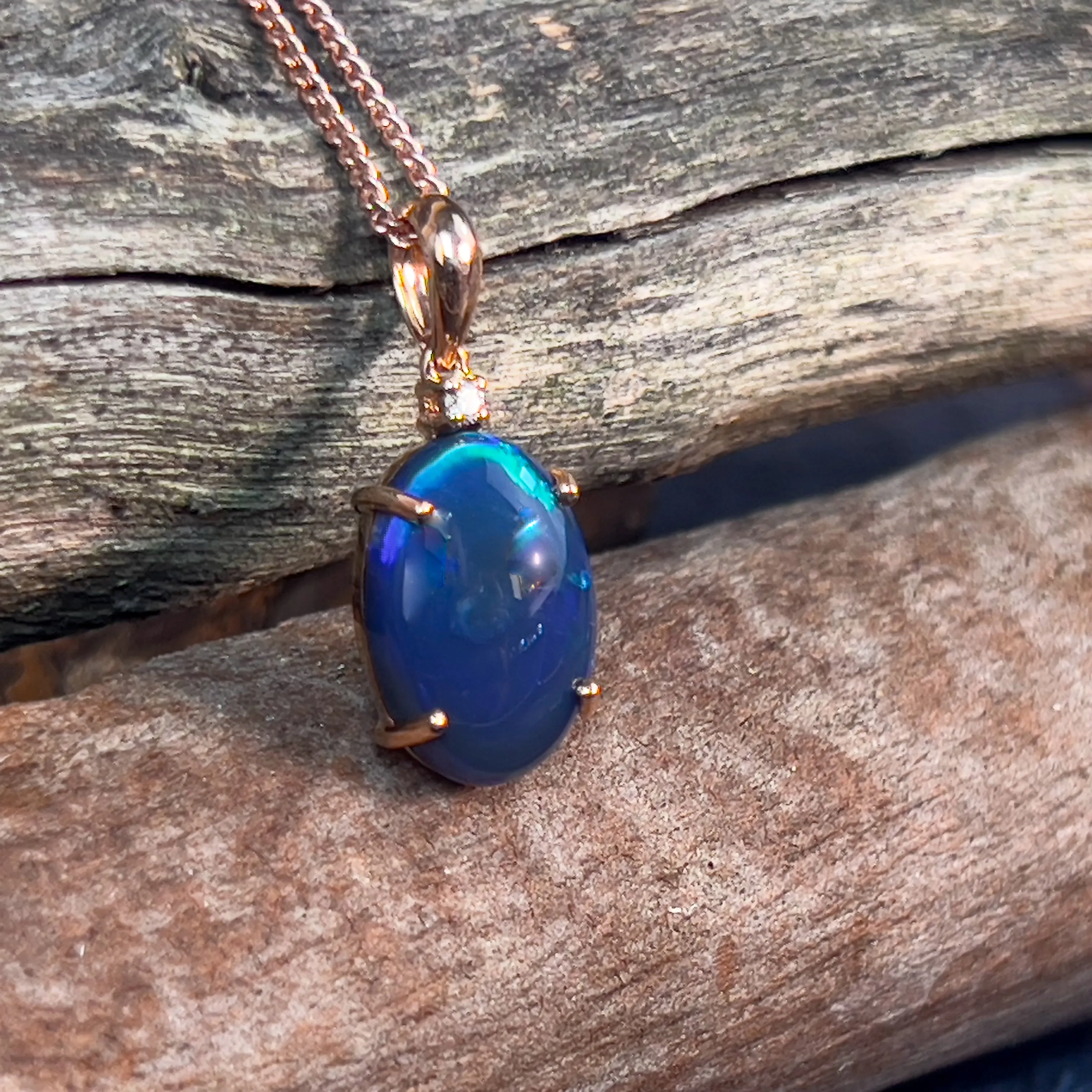 14kt Rose Gold Black Opal 14.2x9.5mm