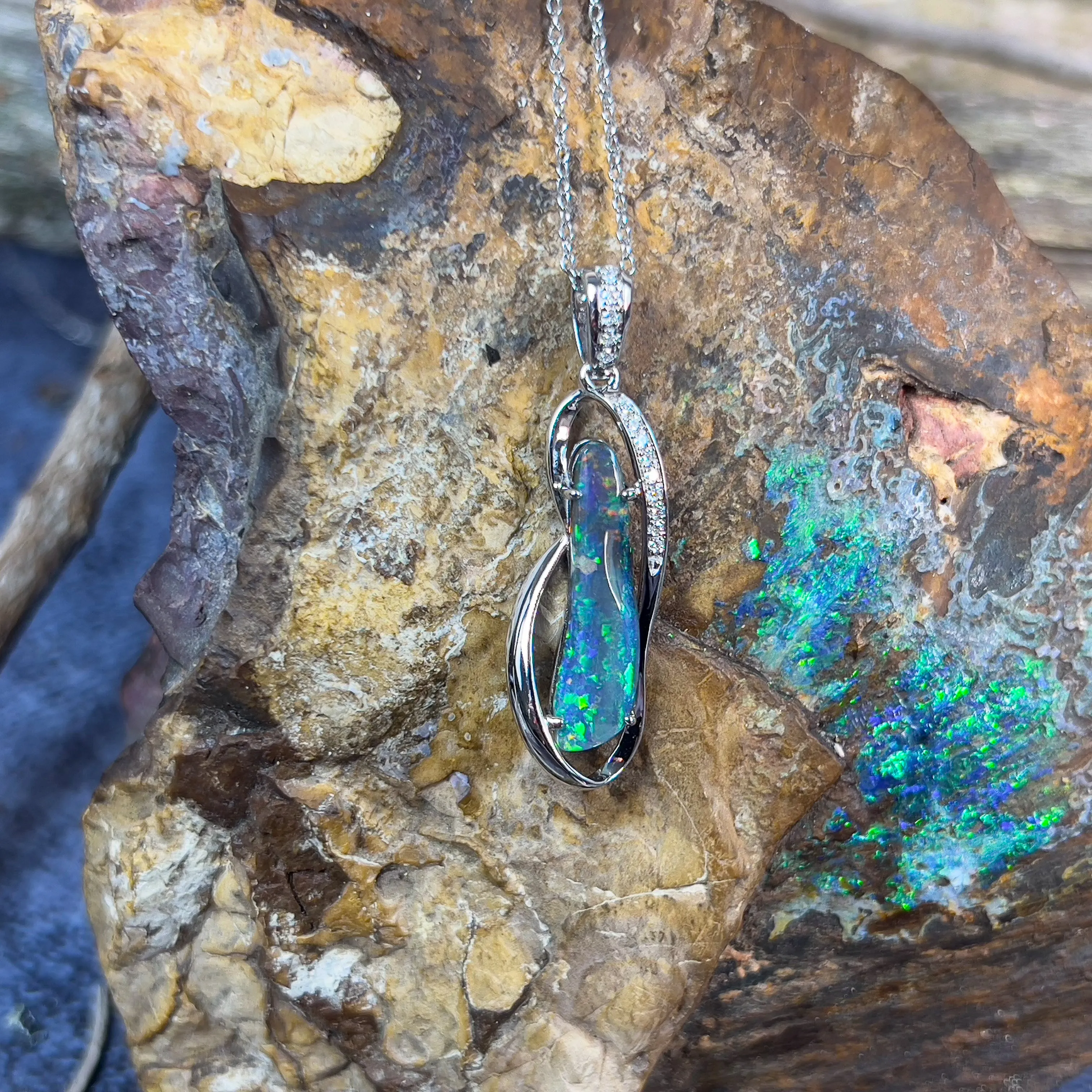 14kt White Gold swirl design Boulder Opal 3.43ct with 14 Diamond 0.1ct
