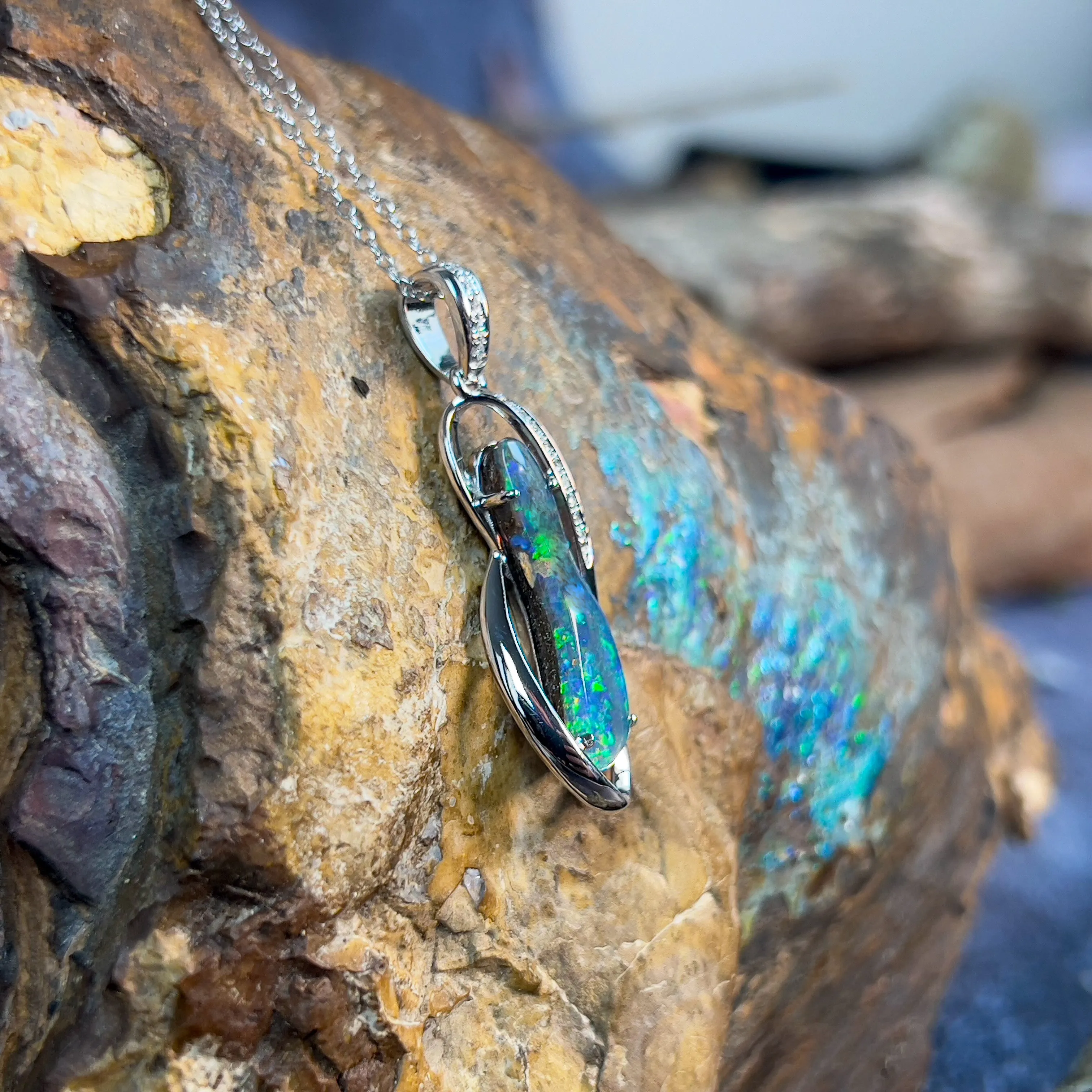 14kt White Gold swirl design Boulder Opal 3.43ct with 14 Diamond 0.1ct