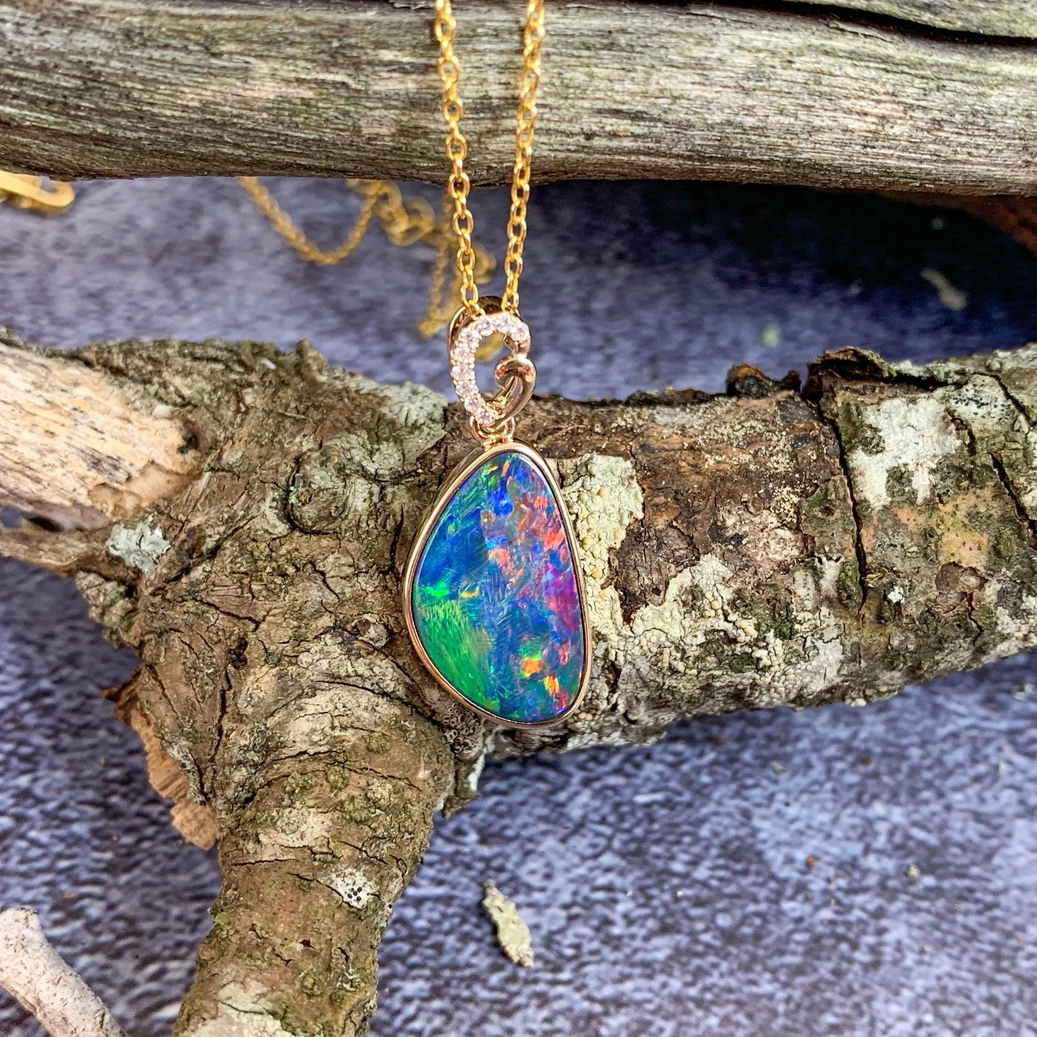 14kt Yellow Gold Red Opal doublet and diamond loop pendant