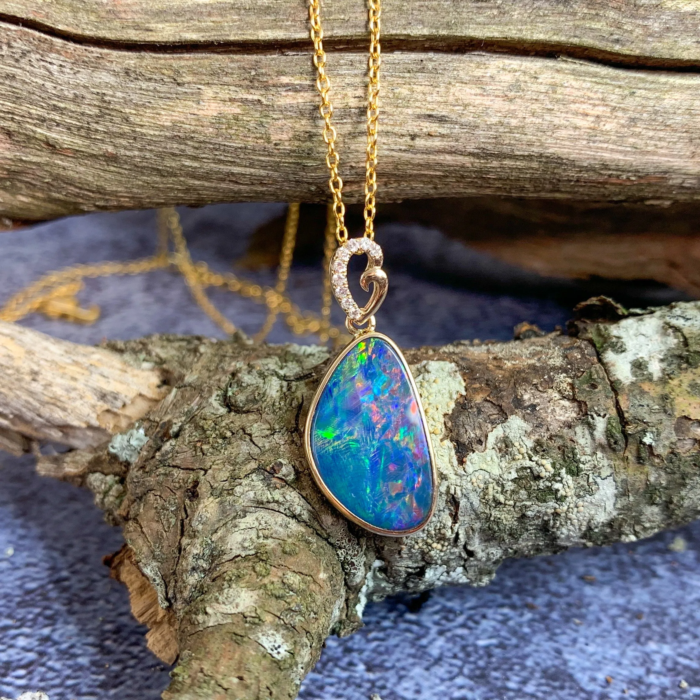 14kt Yellow Gold Red Opal doublet and diamond loop pendant