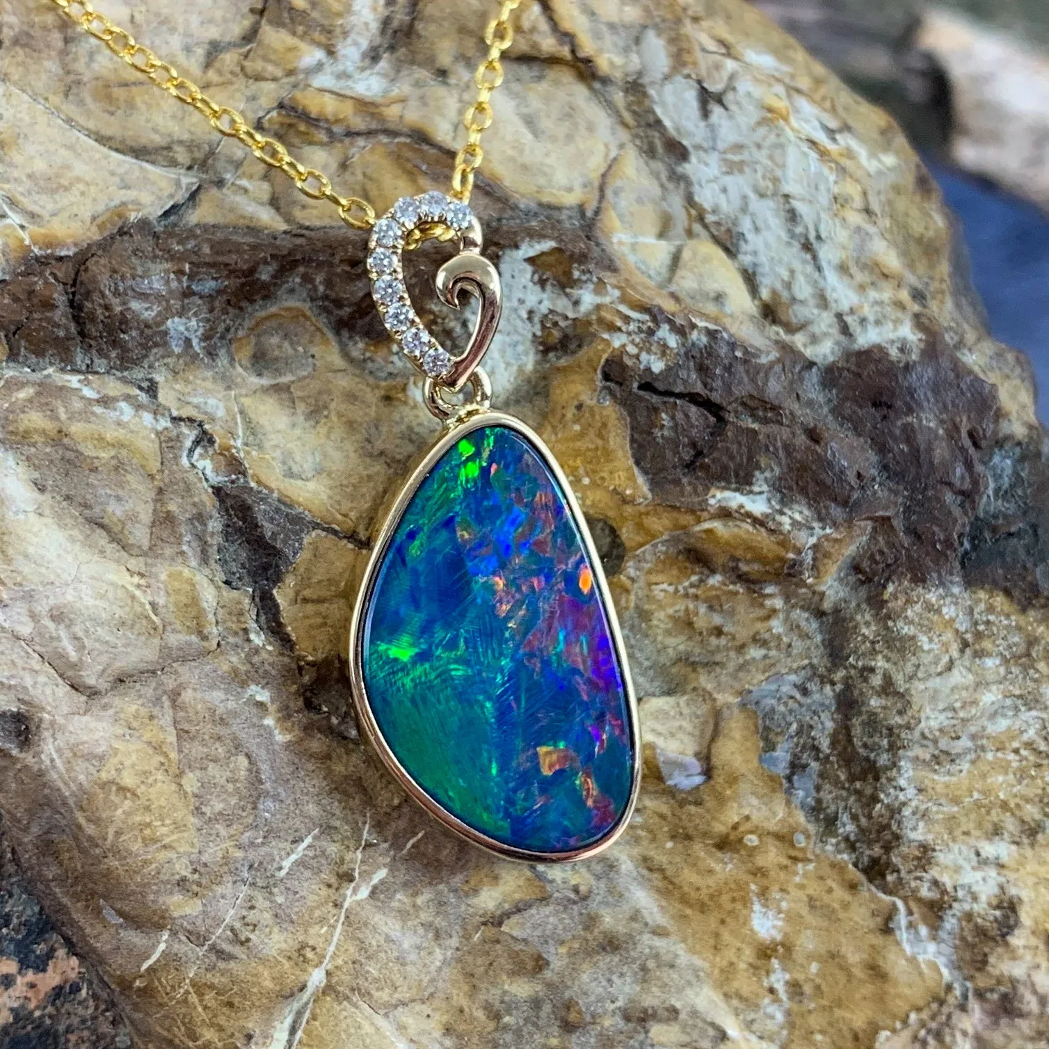 14kt Yellow Gold Red Opal doublet and diamond loop pendant