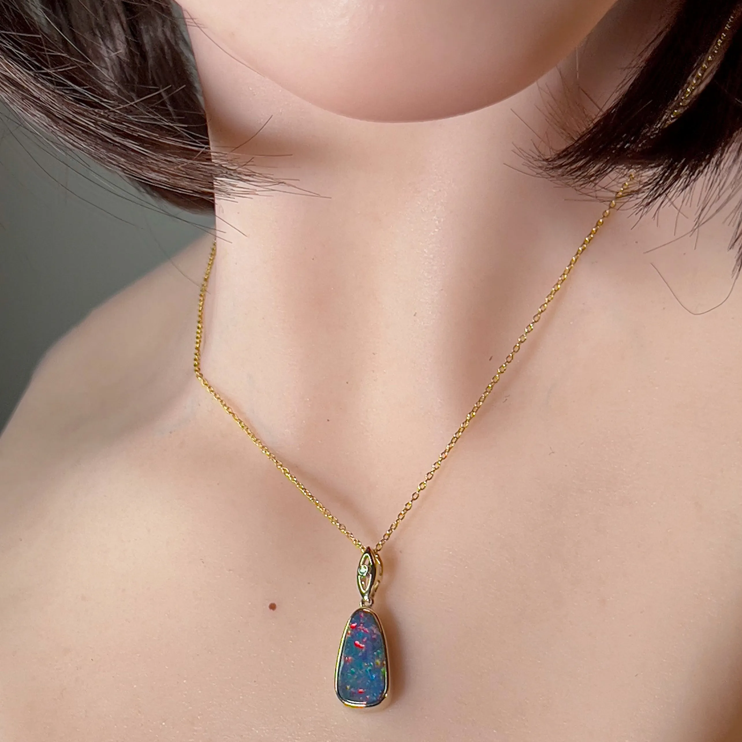 14kt Yellow Gold teardrop shape Opal fire doublet with diamond pendant