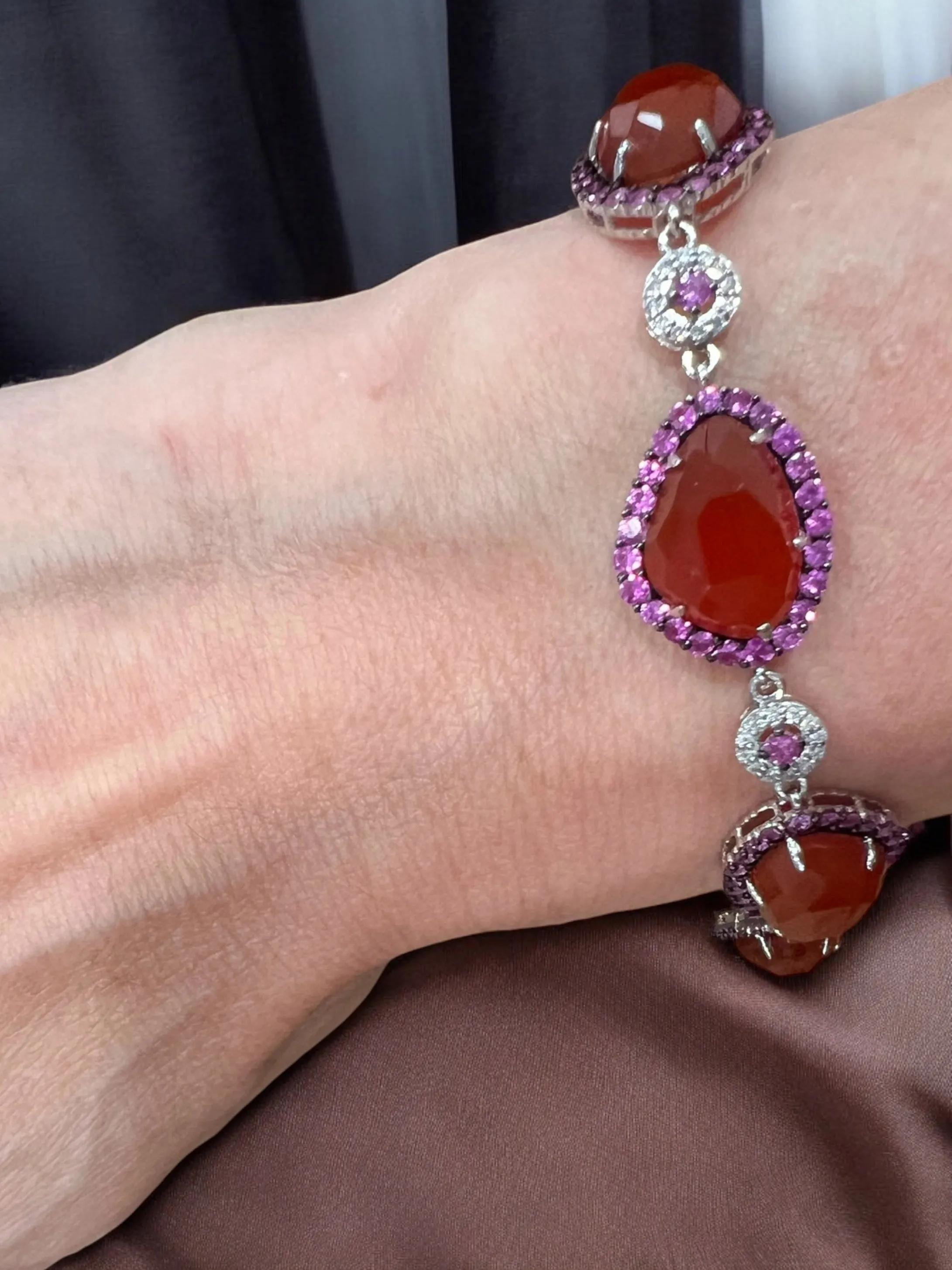 6 carnelians surrounded by hot pink sapphired and diamond bracelet