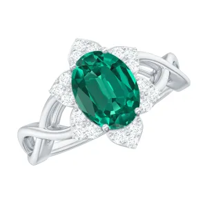 Created Emerald and Diamond Flower Halo Engagement Ring
