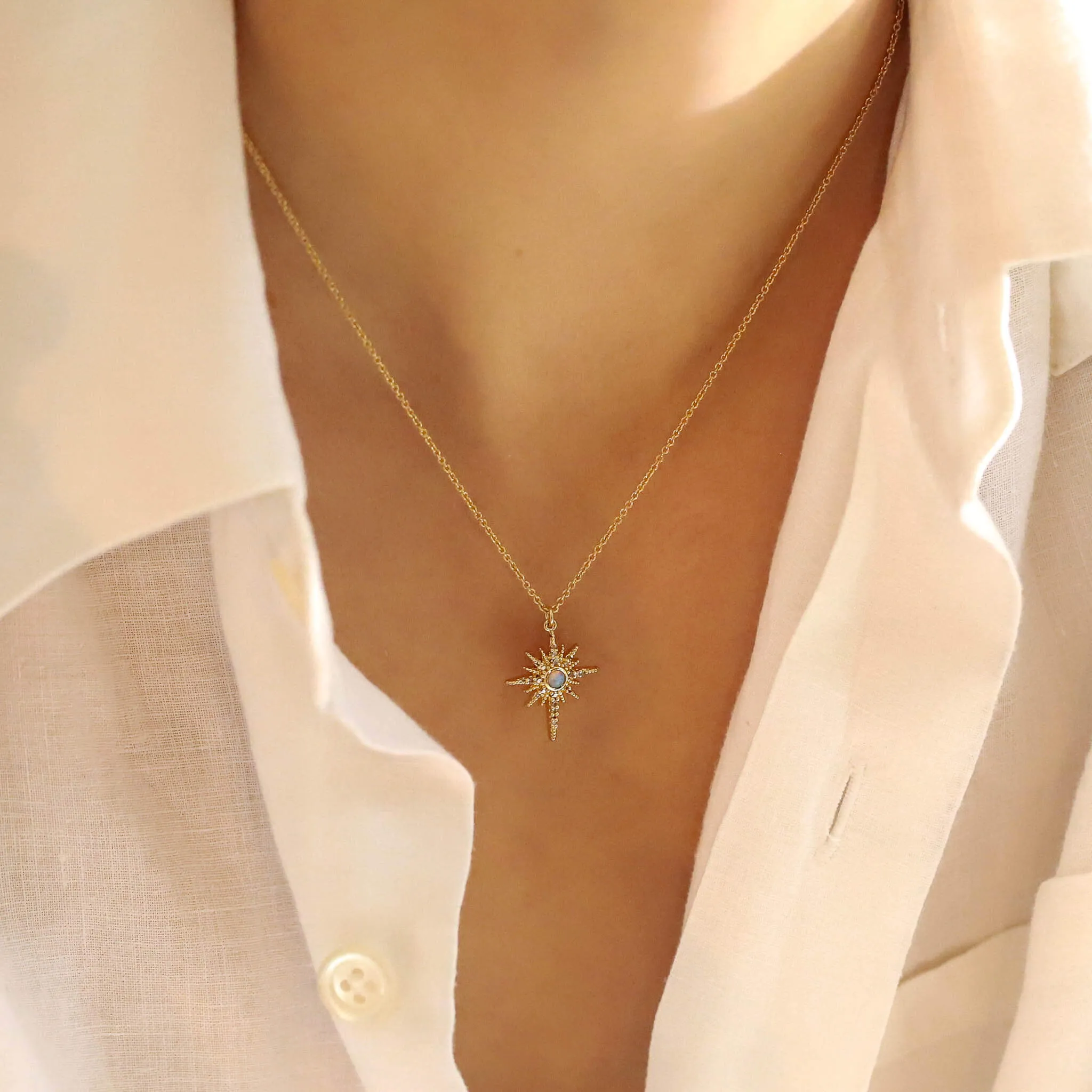 Gold Starburst with Opal Stone Center