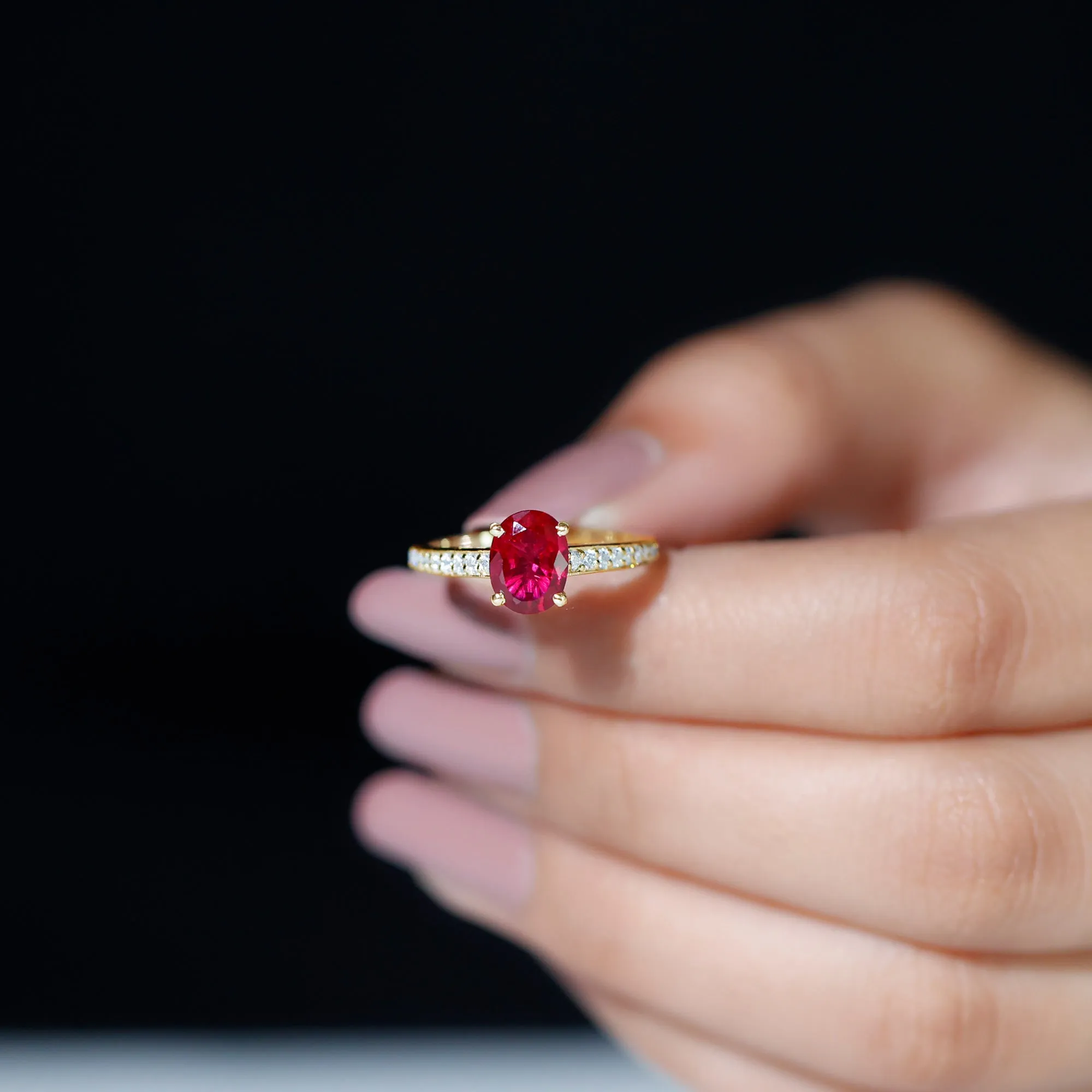 Oval Lab Grown Ruby Solitaire Ring with Moissanite Side Stones