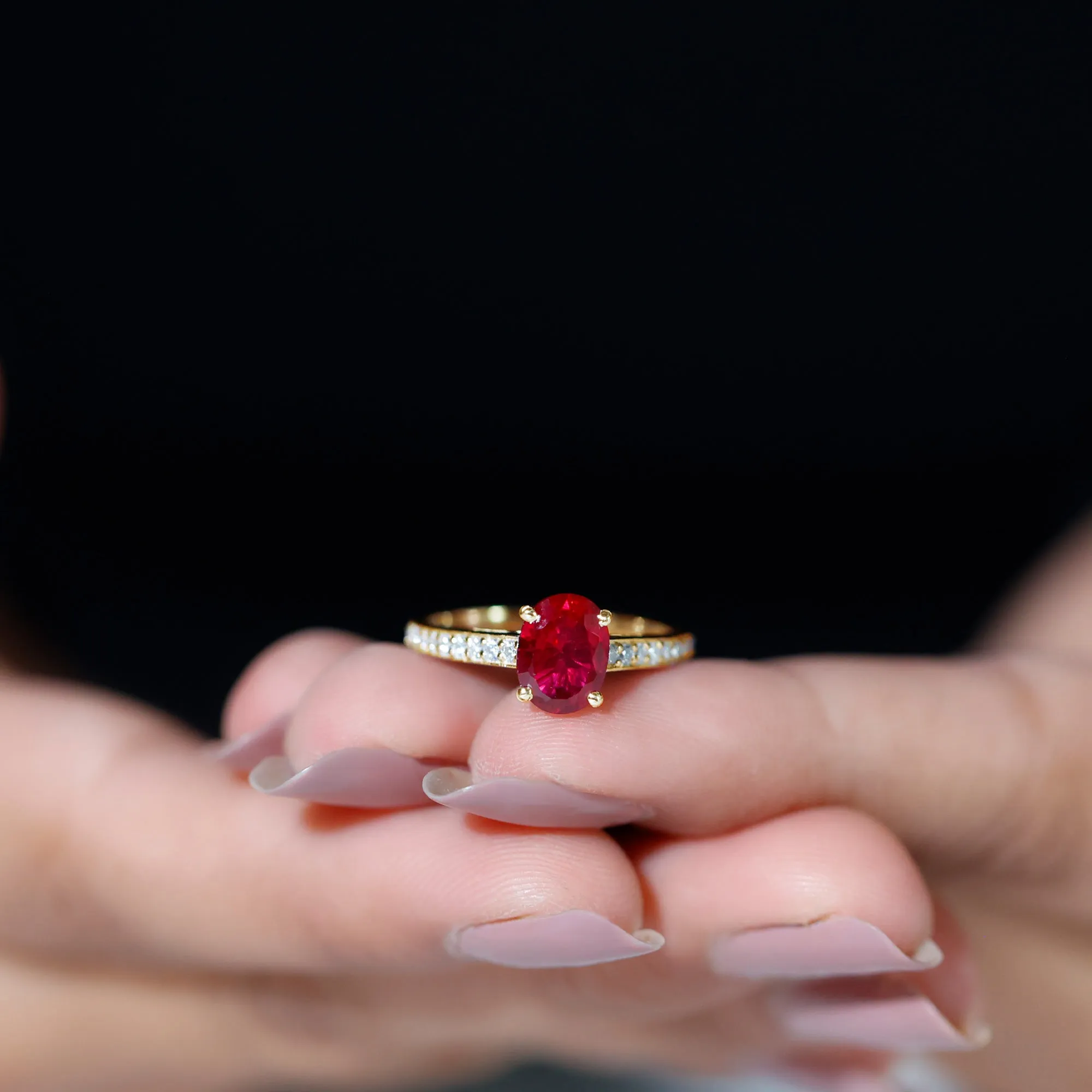 Oval Lab Grown Ruby Solitaire Ring with Moissanite Side Stones