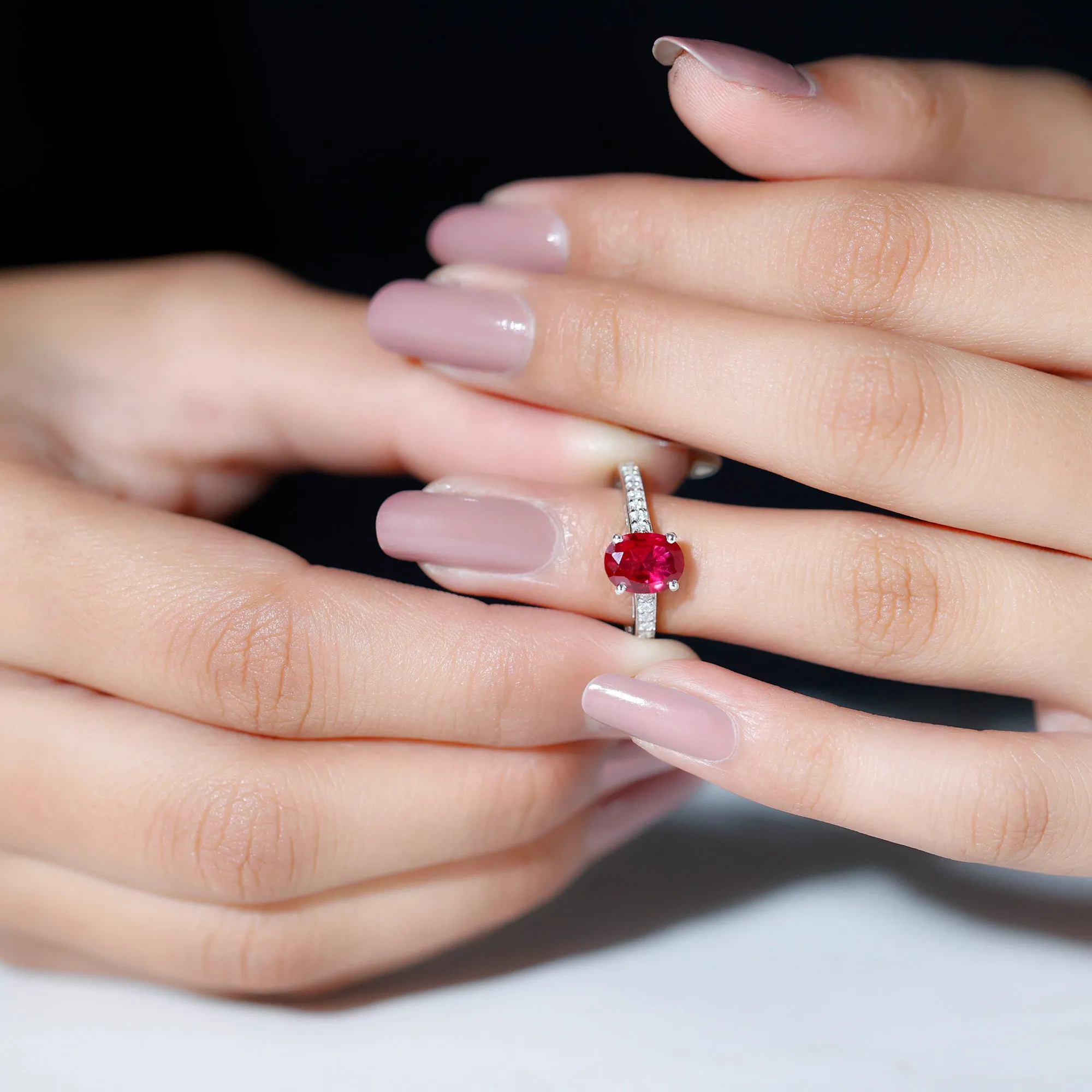 Oval Lab Grown Ruby Solitaire Ring with Moissanite Side Stones
