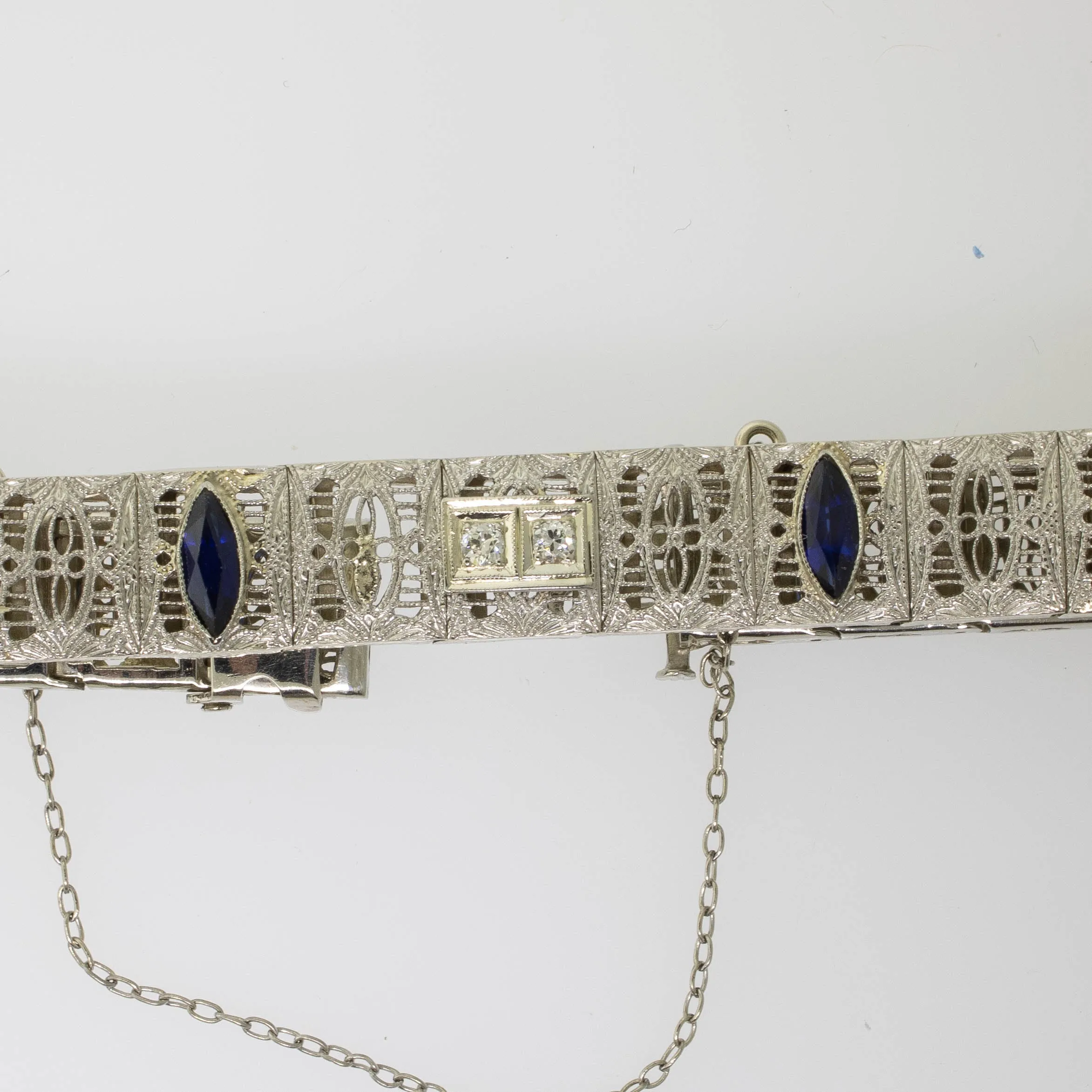 Pre-Owned 14KW Filigree Bracelet 7" 4 Round Diamonds .14CTTW Synthetic Sapphire
