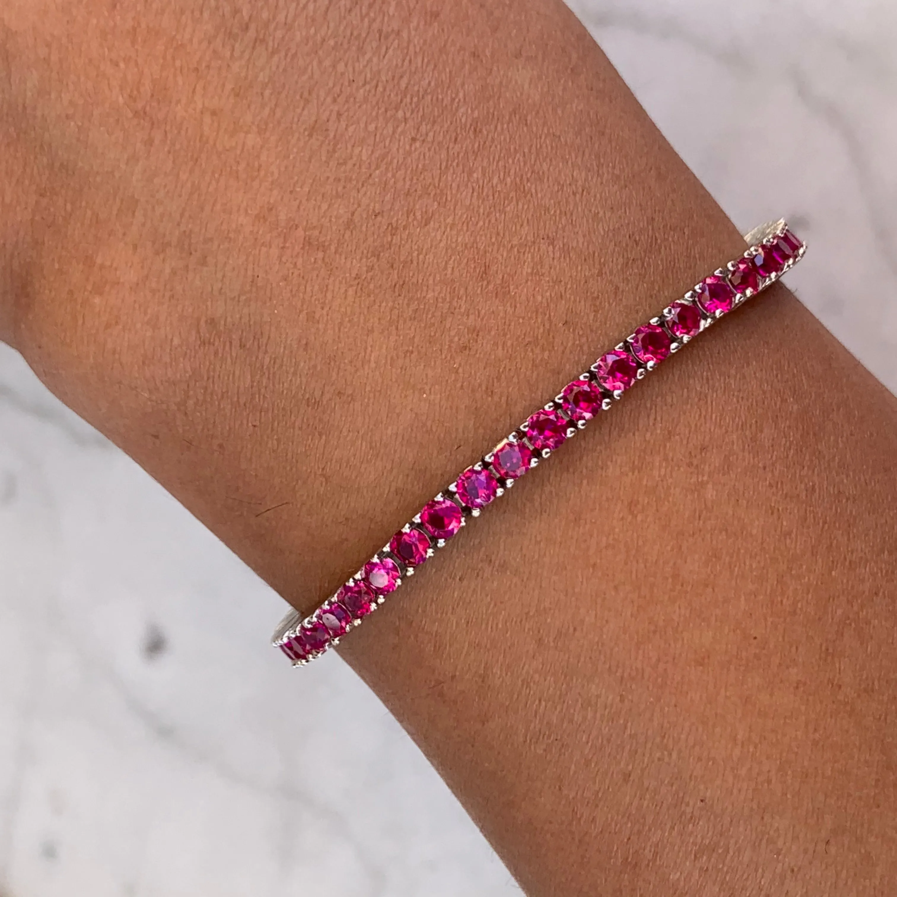Sterling silver ruby pink tennis bracelet