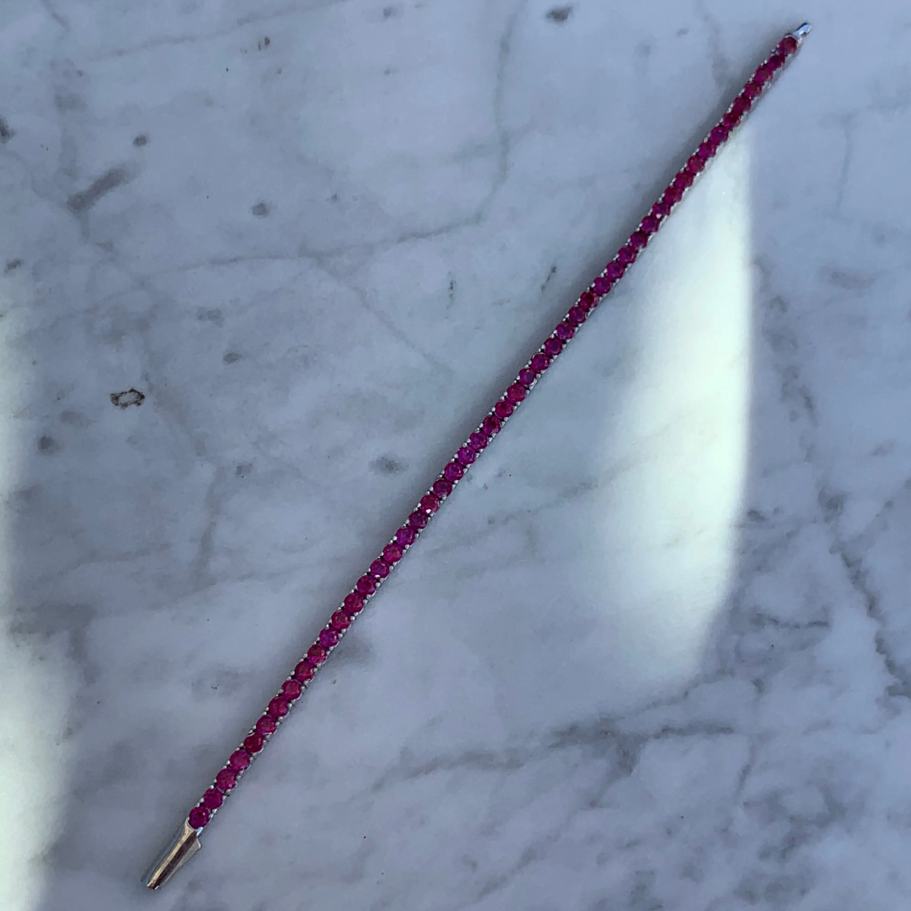Sterling silver ruby pink tennis bracelet