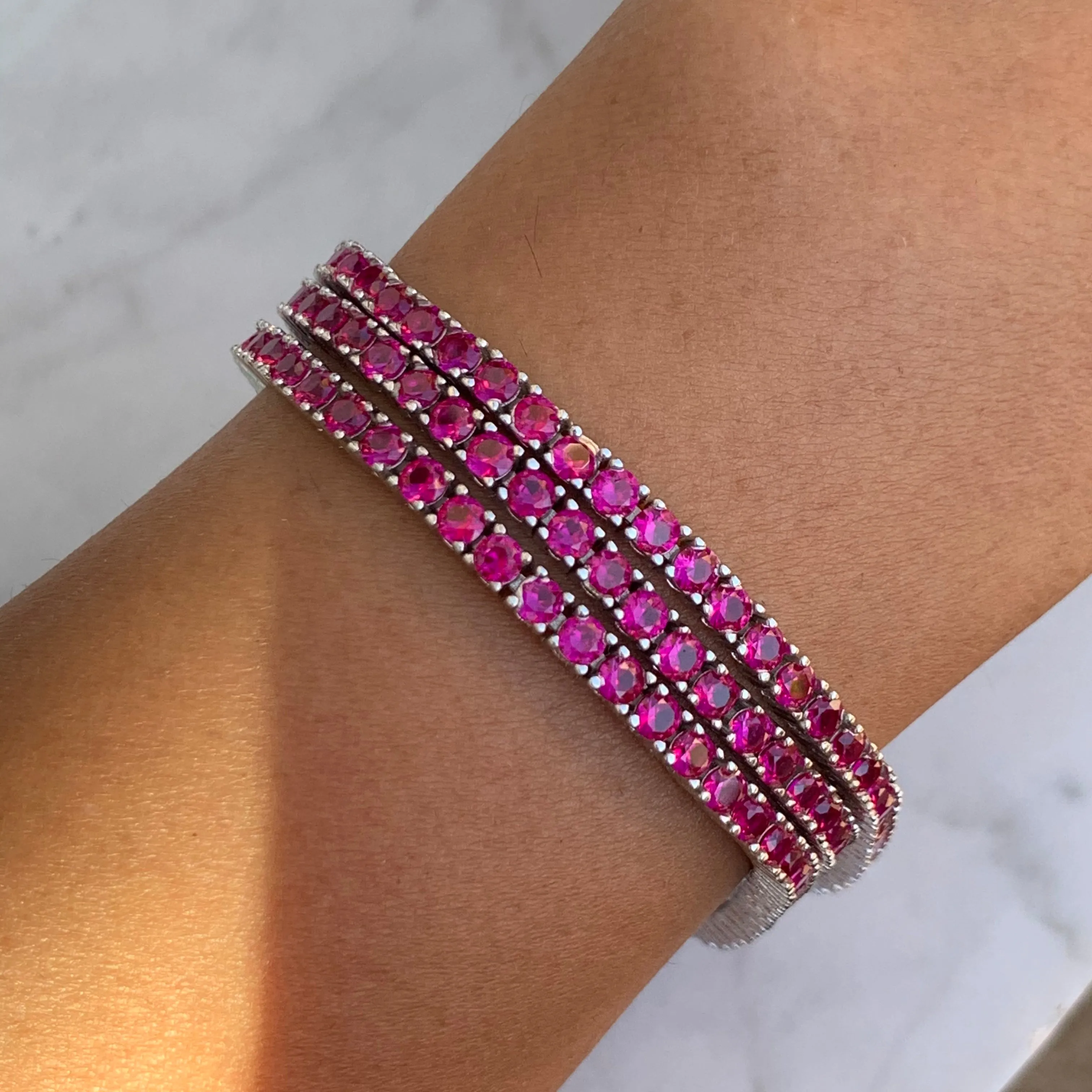 Sterling silver ruby pink tennis bracelet